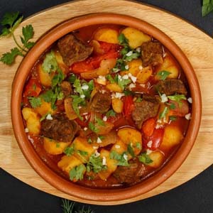 Телятина тушеная с овощами